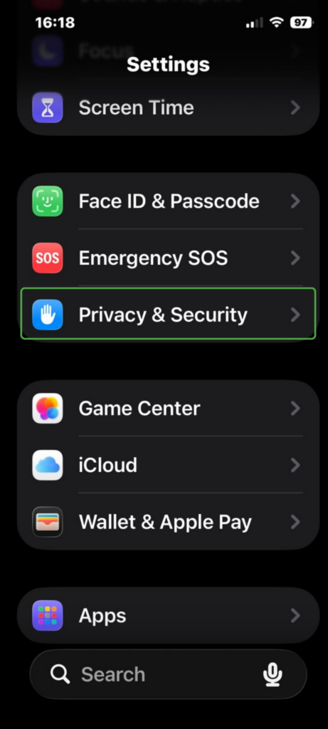 iPhone Settings menu with Privacy and Security highlighted.