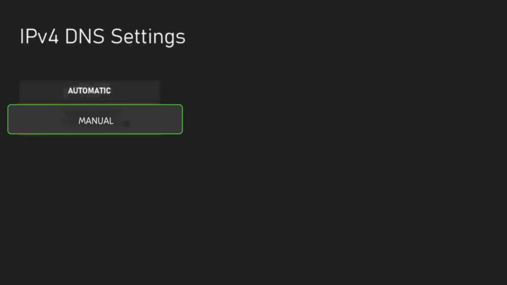 Xbox screen showing the IPv4 DNS Settings menu, with “Manual” highlighted to allow manual entry of DNS addresses.