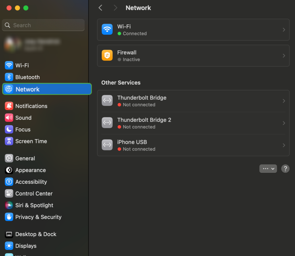 System settings menu open in macOS with Network option highlighted.