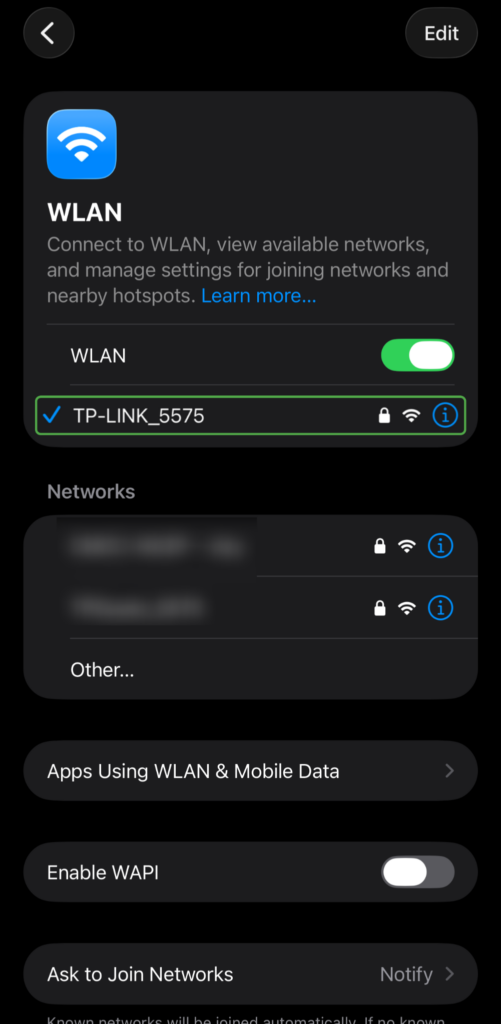 Wi-Fi menu in iOS with connected network highlighted.