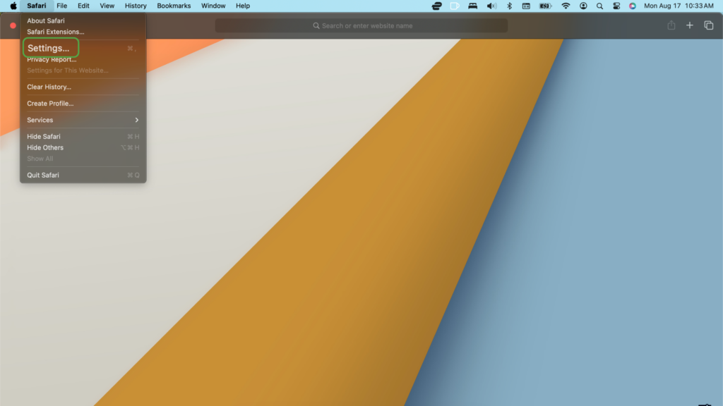 The Safari menu is ope with Settings highlighted.
